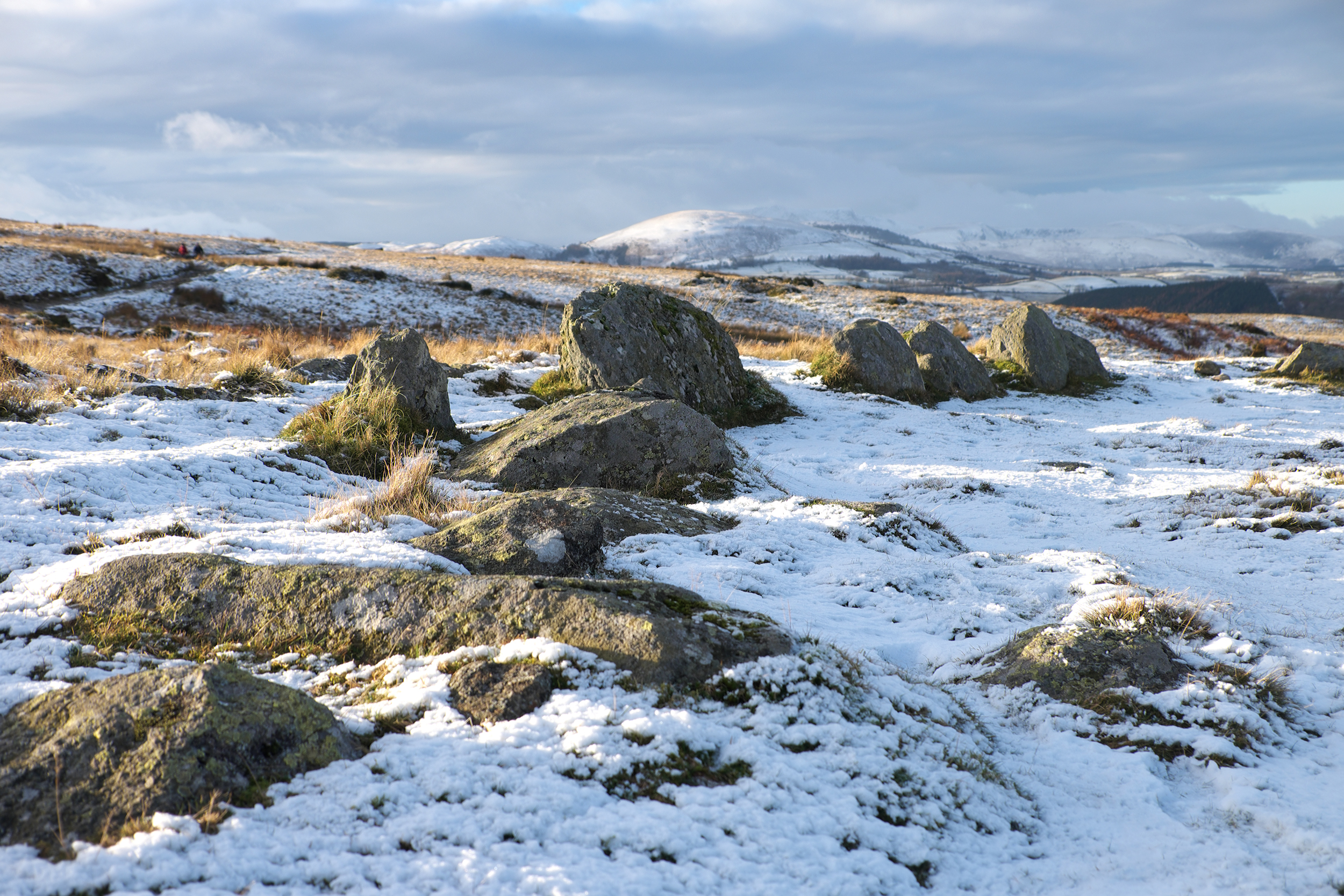 The Cockpit Stone Circle in snow by Vivienne Crow