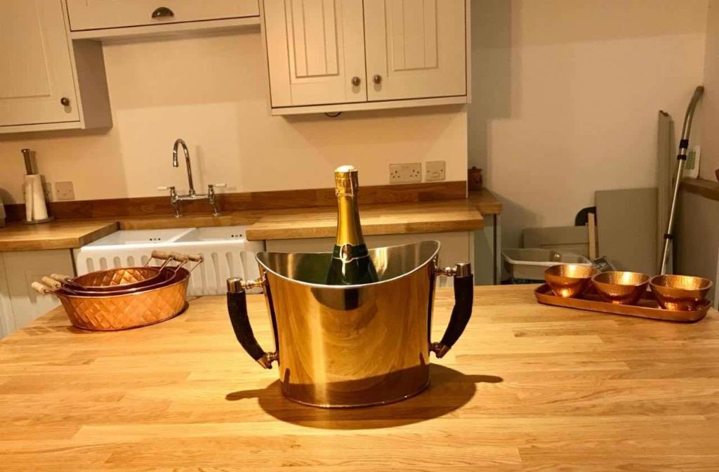 Champagne on ice in Bakers Cottage, Cockermouth - best places to stay in the Lake District