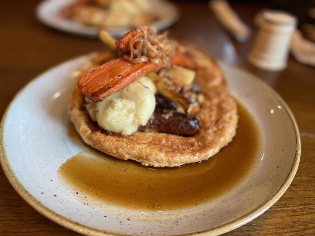 Giant Yorkshire pudding Toad in the Hole at the Coniston Inn 