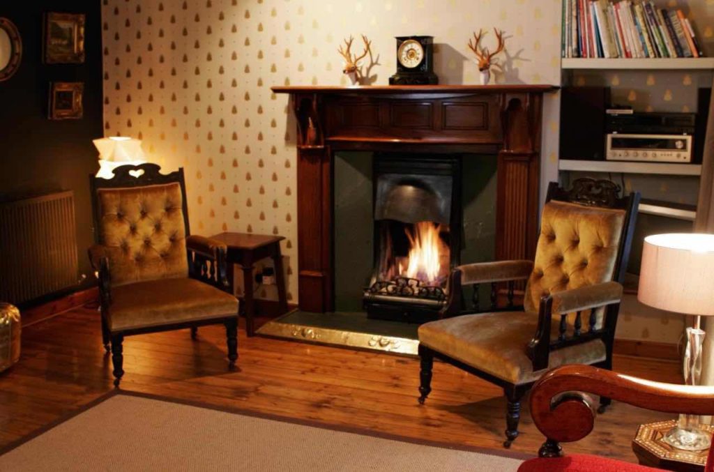 An open fire in the lounge of Twenty Queen Street House, Ulverston - best places to stay in the Lake District