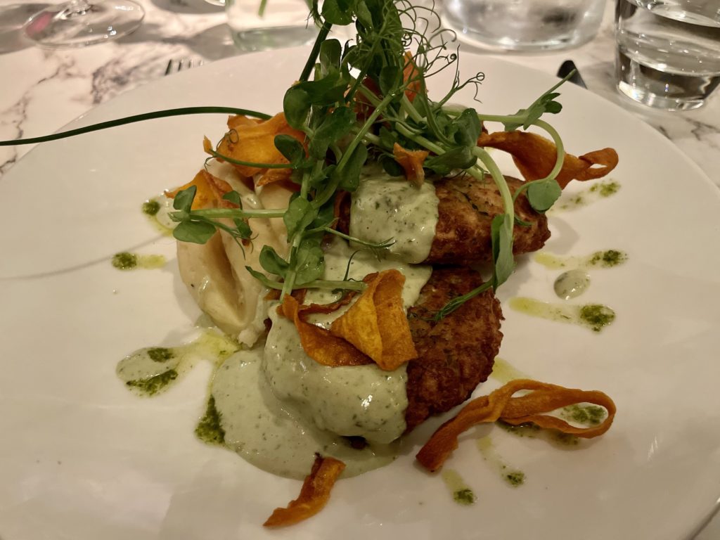 Zucchini and Halloumi fritters with Garlic Mash Potato and Lemon Herb Tahini Sauce - vegetarian fine dining