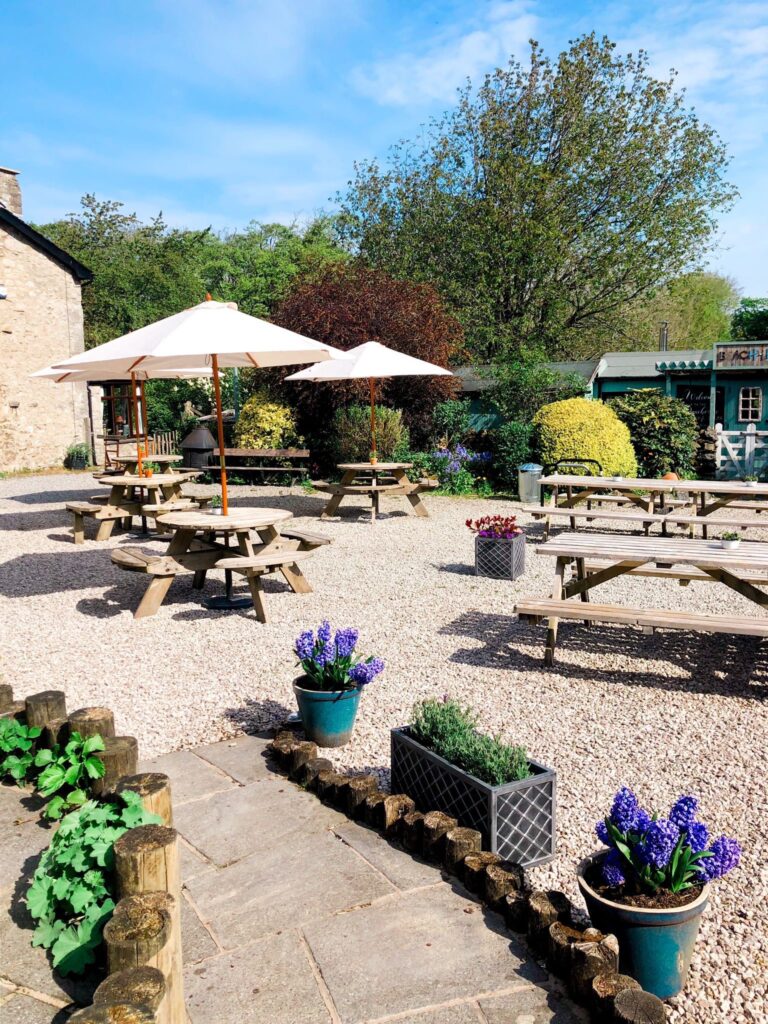Outdoor courtyard and seating area at Wolf & Us cafe, Silverdale
