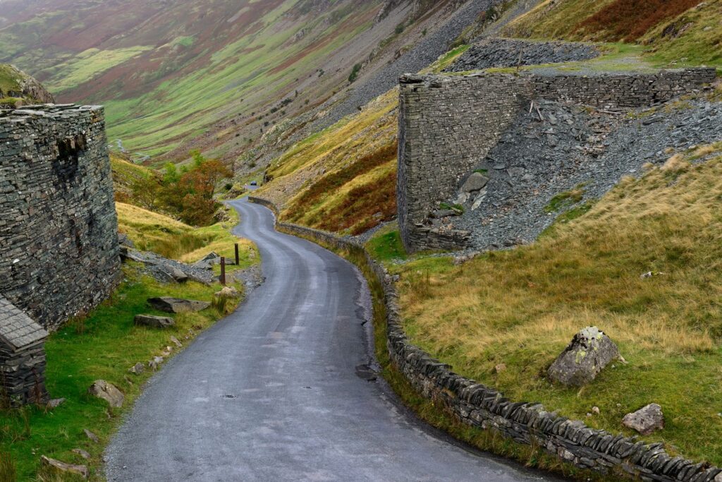 Road climbs to the summit of the Honister Pass in the English Lake District.
